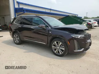 2020 Cadillac XT6 AWD Premium Luxury with VIN 1GYKPDRS4LZ129224, listed as a Copart auction lot 60328745 with 76,290 mi miles and Salvage title. Bid and sale history available at DreamBid. Image 4.