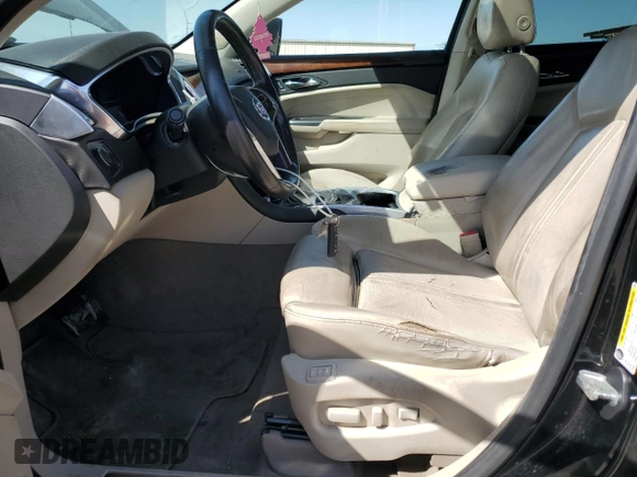 2013 Cadillac SRX Luxury Collection z VIN 3GYFNCE30DS646096, wystawiony jako Copart lot #51967015 z przebiegiem 225 516 mil mil oraz Szkoda całkowita • Salvage title. Historia ofert i sprzedaży dostępna na DreamBid. Obrazek 7.