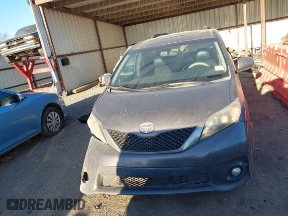 2014 Toyota Sienna SE with VIN 5TDXK3DC1ES462473, listed as a IAAI auction lot 41811437 with 209,704 mi miles and . Bid and sale history available at DreamBid. Image 12.
