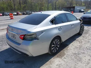 2017 Nissan Altima SV with VIN 1N4AL3AP7HC155010, listed as a IAAI auction lot 42065026 with 241,023 mi miles and . Bid and sale history available at DreamBid. Image 4.