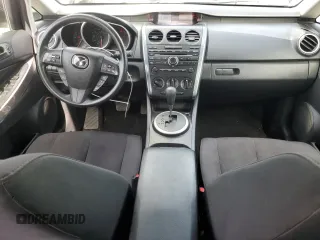 2011 Mazda CX-7 i SV z VIN JM3ER2AMXB0396845, wystawiony jako Copart lot #52347865 z przebiegiem 171 487 mil mil oraz Szkoda całkowita • Salvage title. Historia ofert i sprzedaży dostępna na DreamBid. Obrazek 8.