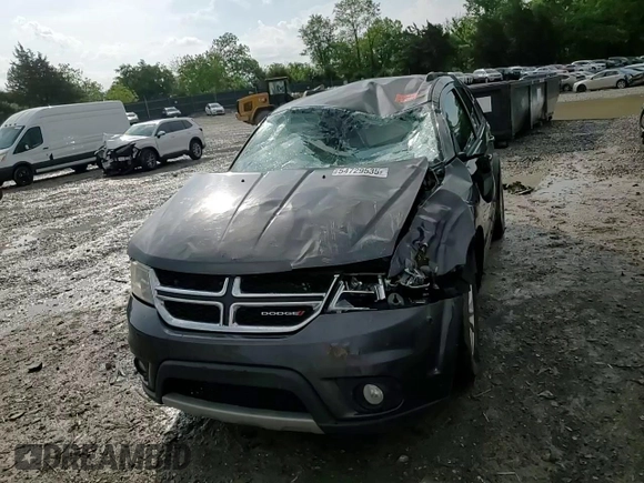 2017 Dodge Journey SXT with VIN 3C4PDCBG2HT533772, listed as a Copart auction lot 54729535 with 160,376 mi miles and Salvage title. Bid and sale history available at DreamBid. Image 14.