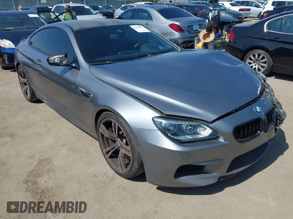 2013 BMW M6 with VIN WBSLX9C51DC968593, listed as a IAAI auction lot 42465979 with 88,010 mi miles and . Bid and sale history available at DreamBid. Image 1.