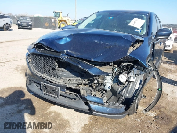 2017 Mazda CX-5 Touring with VIN JM3KFACL1H0192549, listed as a IAAI auction lot 41667781 with 89,030 mi miles. Bid and sale history available at carsss.com. Image 6.