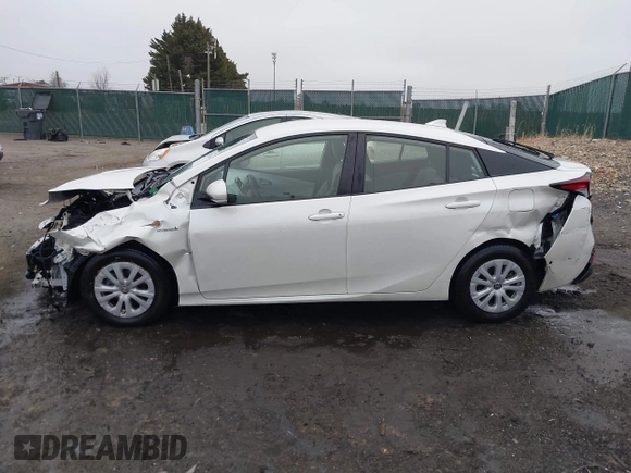 2019 Toyota Prius L Eco z VIN JTDKARFU8K3081187, wystawiony jako IAAI lot #41771346 z przebiegiem 64 864 mil mil oraz . Historia ofert i sprzedaży dostępna na DreamBid. Obrazek 14.
