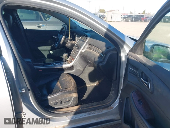 2013 Chevrolet Malibu LTZ with VIN 1G11H5SA7DU138464, listed as a IAAI auction lot 41517379 with 116,430 mi miles and . Bid and sale history available at DreamBid. Image 5.