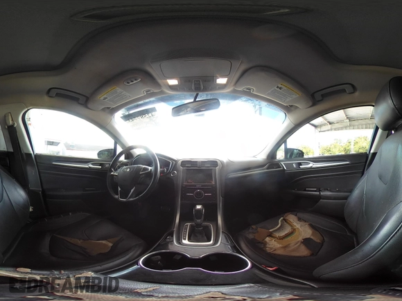 2016 Ford Fusion Titanium with VIN 3FA6P0K99GR235692, listed as a IAAI auction lot 42587743 with 169,467 mi miles and . Bid and sale history available at DreamBid. Image 18.