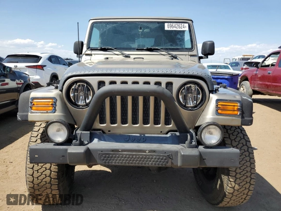 2004 Jeep Wrangler Rubicon with VIN 1J4FA69S64P751349, listed as a Copart auction lot 69642624 with 160,589 mi miles and Salvage Title. Bid and sale history available at carsss.com. Image 5.