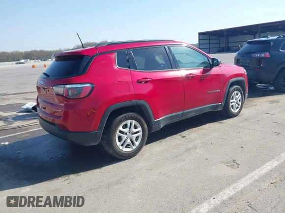 2018 Jeep Compass Sport with VIN 3C4NJCAB3JT255203, listed as a IAAI auction lot 42052746 with 112,451 mi miles and . Bid and sale history available at DreamBid. Image 4.