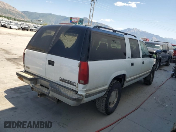 1999 Chevrolet Suburban with VIN 3GNFK16R4XG190883, listed as a Copart auction lot 58324415 with 228,782 mi miles and Salvage title. Bid and sale history available at DreamBid. Image 3.