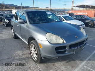 2004 Porsche Cayenne S with VIN WP1AB29P24LA72573, listed as a IAAI auction lot 41610225 with 143,280 mi miles. Bid and sale history available at carsss.com. Image 1.