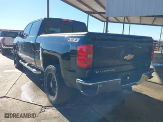 2015 Chevrolet Silverado 1500 LTZ with VIN 3GCUKSEC0FG482502, listed as a IAAI auction lot 41292001 with 129,622 mi miles. Bid and sale history available at carsss.com. Image 3.