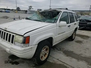 1997 Jeep Grand Cherokee Limited with VIN 1J4GX78YXVC716353, listed as a Copart auction lot 85207974 with 115,527 mi miles and Salvage Title. Bid and sale history available at carsss.com. Image 12.