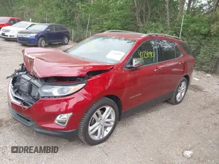 2018 Chevrolet Equinox Premier z VIN 2GNAXMEV3J6329268, wystawiony jako IAAI lot #42240907 z przebiegiem 61 487 mil mil oraz . Historia ofert i sprzedaży dostępna na DreamBid. Obrazek 2.