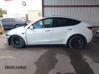 2023 Tesla Model Y Long Range with VIN 7SAYGAEE0PF787216, listed as a IAAI auction lot 41589954 with 17,985 mi miles and . Bid and sale history available at DreamBid. Image 15.