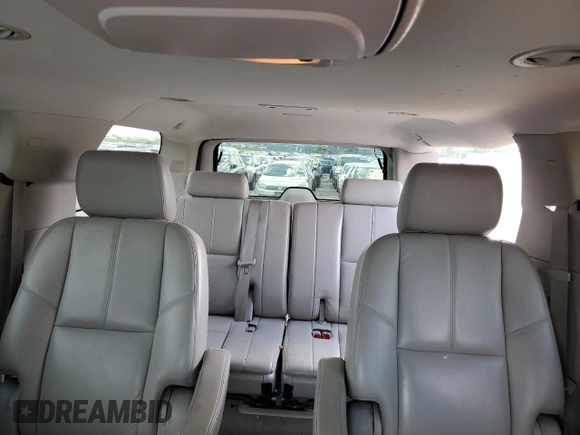 2011 Chevrolet Suburban LT with VIN 1GNSKJE35BR394032, listed as a Copart auction lot 59235184 with 248,979 mi miles and Salvage Title. Bid and sale history available at carsss.com. Image 10.
