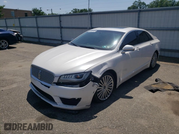 2017 Lincoln MKZ Hybrid Reserve z VIN 3LN6L5MU7HR602252, wystawiony jako Copart lot #62481445 z przebiegiem 142 003 mil mil oraz Czysty tytuł • Clean title. Historia ofert i sprzedaży dostępna na DreamBid. Obrazek 1.
