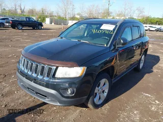 2013 Jeep Compass Sport with VIN 1C4NJDBB4DD113831, listed as a IAAI auction lot 42059122 with 135,062 mi miles. Bid and sale history available at carsss.com. Image 2.