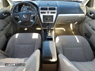 2006 Mercury Milan with VIN 3MEFM07176R612667, listed as a Copart auction lot 77498664 with 145,760 mi miles and Salvage title. Bid and sale history available at DreamBid. Image 8.