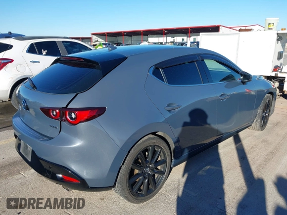 2022 Mazda Mazda3 Hatchback Premium with VIN JM1BPBML8N1520307, listed as a IAAI auction lot 41059877 with 39,497 mi miles. Bid and sale history available at carsss.com. Image 4.
