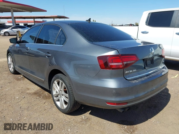 2017 Volkswagen Jetta SEL z VIN 3VWL17AJ6HM407708, wystawiony jako IAAI lot #41848360 z przebiegiem Nie podano mil oraz . Historia ofert i sprzedaży dostępna na DreamBid. Obrazek 3.