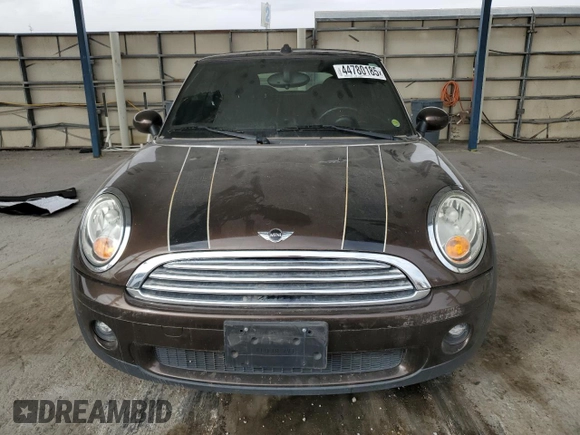 2010 MINI Convertible with VIN WMWMR3C50ATU97547, listed as a Copart auction lot 44780185 with 91,194 mi miles and Salvage Title. Bid and sale history available at DreamBid. Image 5.