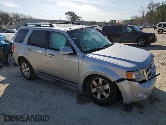 2010 Ford Escape Limited with VIN 1FMCU0E71AKC71285, listed as a Copart auction lot 61344164 with 163,471 mi miles and Salvage title. Bid and sale history available at DreamBid. Image 4.
