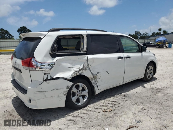 2014 Toyota Sienna L with VIN 5TDZK3DC3ES430634, listed as a Copart auction lot 60715375 with 122,621 mi miles and Salvage title. Bid and sale history available at DreamBid. Image 3.