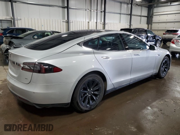 2014 Tesla Model S 60 with VIN 5YJSA1H15EFP51239, listed as a Copart auction lot 59214485 with 153,554 mi miles and Salvage title. Bid and sale history available at DreamBid. Image 3.