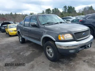2003 Ford F-150 XLT with VIN 1FTRW08L63KA37275, listed as a IAAI auction lot 41875128 with 133,257 mi miles. Bid and sale history available at carsss.com. Image 1.