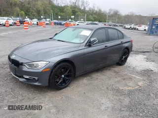 2013 BMW 3 Series 328i xDrive with VIN WBA3B3C56DF542509, listed as a IAAI auction lot 42010587 with 187,082 mi miles. Bid and sale history available at carsss.com. Image 21.