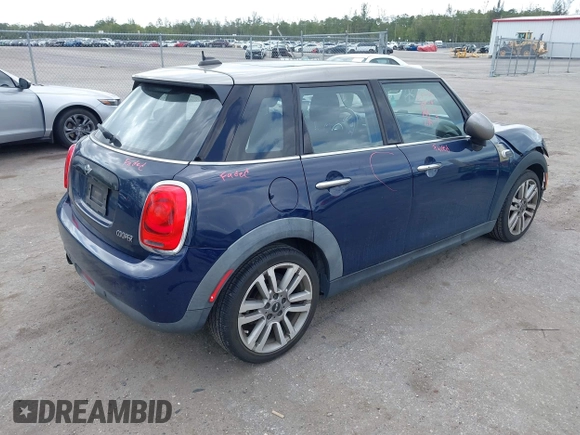 2017 MINI Hardtop 4 Door Cooper with VIN WMWXU1C54H2E19114, listed as a IAAI auction lot 42107266 with 83,524 mi miles and . Bid and sale history available at DreamBid. Image 4.