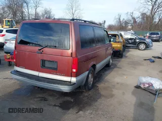 1999 Chevrolet Astro with VIN 1GNEL19W5XB102247, listed as a IAAI auction lot 41598483 with 184,041 mi miles. Bid and sale history available at carsss.com. Image 4.