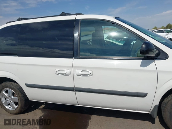 2005 Dodge Caravan SXT with VIN 1D4GP45R95B181591, listed as a IAAI auction lot 42628977 with 140,361 mi miles and . Bid and sale history available at DreamBid. Image 14.