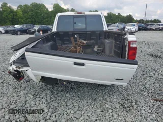 2002 Ford Ranger XL Fleet with VIN 1FTYR44U42TA55243, listed as a Copart auction lot 57310015 with 135,974 mi miles and Salvage title. Bid and sale history available at DreamBid. Image 6.
