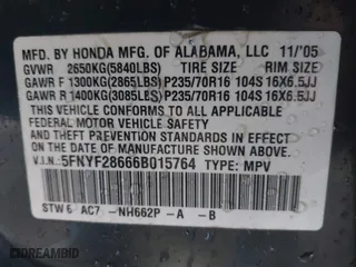 2006 Honda Pilot EX-L with RES with VIN 5FNYF28666B015764, listed as a IAAI auction lot 41703704 with 211,289 mi miles. Bid and sale history available at carsss.com. Image 9.