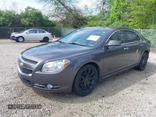 2012 Chevrolet Malibu LTZ with VIN 1G1ZG5E74CF297032, listed as a IAAI auction lot 42133482 with 82,682 mi miles and . Bid and sale history available at DreamBid. Image 2.