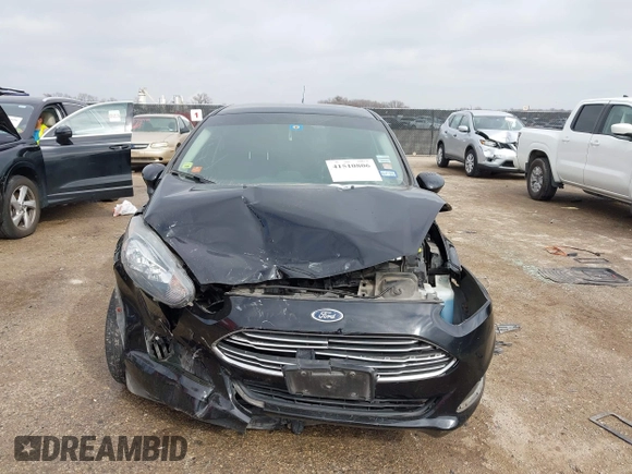 2019 Ford Fiesta SE z VIN 3FADP4BJ7KM158142, wystawiony jako IAAI lot #41510806 z przebiegiem 55 315 mil mil oraz . Historia ofert i sprzedaży dostępna na DreamBid. Obrazek 12.
