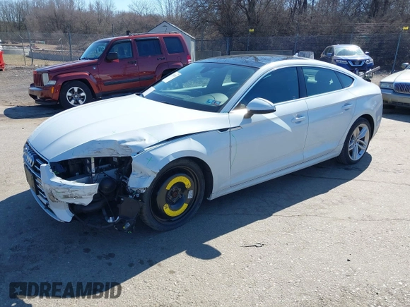 2019 Audi A5 Sportback Premium Plus with VIN WAUBNCF53KA023202, listed as a IAAI auction lot 41749214 with 40,716 mi miles and . Bid and sale history available at DreamBid. Image 18.