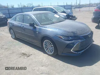 2021 Toyota Avalon Limited Hybrid z VIN 4T1CA1AB5MU006094, wystawiony jako IAAI lot #41859129 z przebiegiem 70 423 mil mil oraz . Historia ofert i sprzedaży dostępna na DreamBid. Obrazek 1.