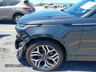 2020 Land Rover Range Rover Velar R-Dynamic S z VIN SALYK2EX5LA243809, wystawiony jako IAAI lot #42200383 z przebiegiem 66 381 mil mil oraz . Historia ofert i sprzedaży dostępna na DreamBid. Obrazek 21.