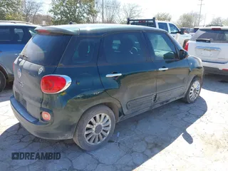 2014 FIAT 500L Easy with VIN ZFBCFABH4EZ005079, listed as a IAAI auction lot 41674028 with 95,407 mi miles and . Bid and sale history available at DreamBid. Image 4.