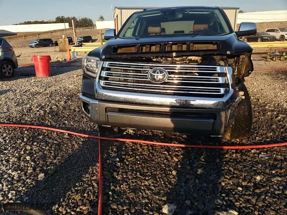 2019 Toyota Tundra 4WD SR5 with VIN 5TFAY5F13KX832503, listed as a Copart auction lot 46536825 with 128,063 mi miles and Salvage Title. Bid and sale history available at carsss.com. Image 14.