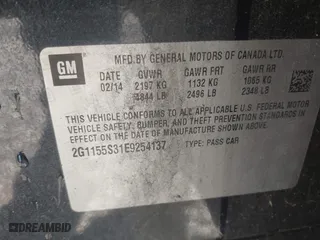 2014 Chevrolet Impala LTZ with VIN 2G1155S31E9254137, listed as a IAAI auction lot 41986102 with 184,296 mi miles. Bid and sale history available at carsss.com. Image 9.