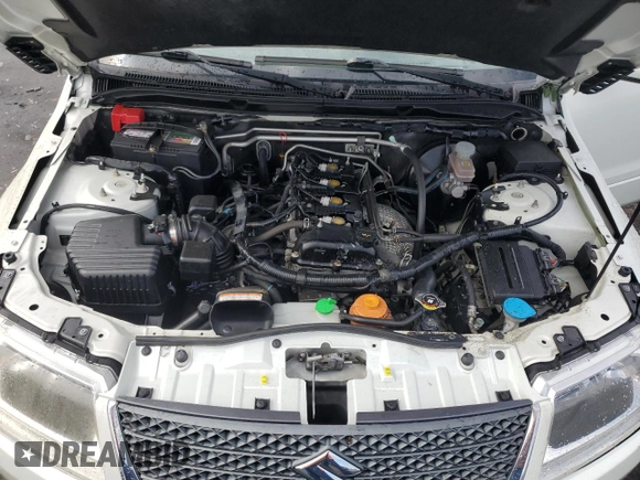 2010 Suzuki Grand Vitara Premium with VIN JS3TD0D26A4101181, listed as a Copart auction lot 62923755 with 177,893 mi miles and Salvage title. Bid and sale history available at DreamBid. Image 12.
