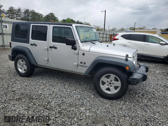 2008 Jeep Wrangler Unlimited X with VIN 1J4GB39148L565250, listed as a Copart auction lot 51170505 with 153,344 mi miles and Salvage Title. Bid and sale history available at DreamBid. Image 4.