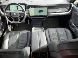 2023 Rivian R1S Adventure with VIN 7PDSGBBA5PN021048, listed as a Copart auction lot 44407815 with 10,642 mi miles and Salvage Title. Bid and sale history available at carsss.com. Image 8.
