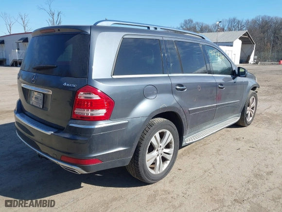 2011 Mercedes-Benz GL-Class GL 450 with VIN 4JGBF7BE3BA682308, listed as a IAAI auction lot 41729779 with 129,771 mi miles. Bid and sale history available at carsss.com. Image 4.