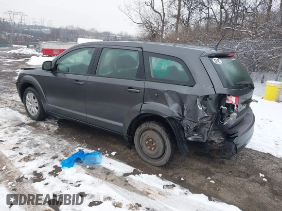 2014 Dodge Journey SE with VIN 3C4PDCAB0ET182376, listed as a IAAI auction lot 41569006 with 106,024 mi miles and . Bid and sale history available at DreamBid. Image 3.