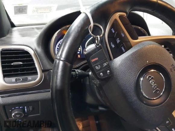2014 Jeep Grand Cherokee Limited with VIN 1C4RJFBG5EC431019, listed as a IAAI auction lot 42402521 with 151,506 mi miles and . Bid and sale history available at DreamBid. Image 11.